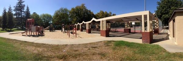 Play structure and tennis courts.