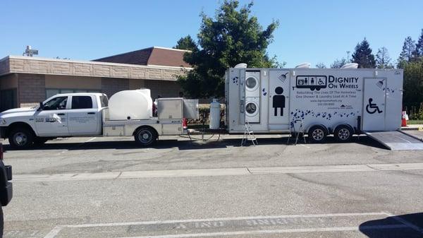 Decals by Daneen placed on the Dignity On Wheels mobile shower and laundry trailer for the homeless. We love it!