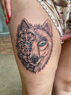 Ornamental wolf tattoo