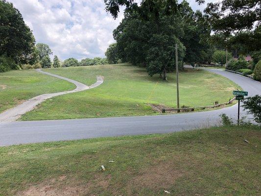 this is on the back nine. the tee box is above the road at the corner of Fairway and Kensington