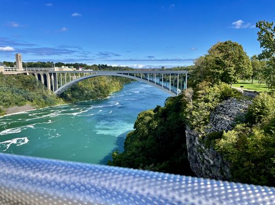 View of the Rainbow International Bridge from the observation deck above Niagara Falls.