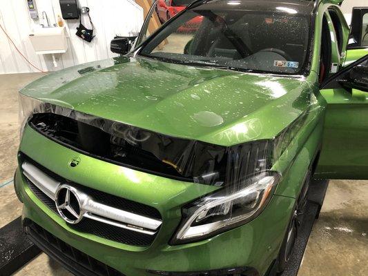 Currently working on wrapping the hood on this AMG GLA45 in our XPEL Clear Bra. This car is in for a full body wrap for maximum protection!