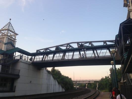 Go through train station, up three stories by elevator, cross bridge, elevator down... That sounds like Lafayette! ;)