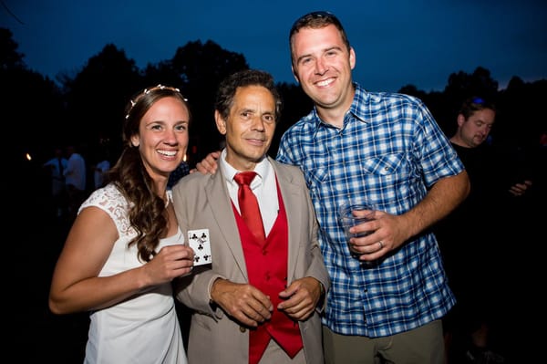 The Bride and Groom with their Magician.