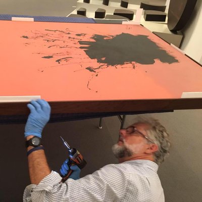 Installing on location Boca Museum: painting by artist Adolph Gottlieb