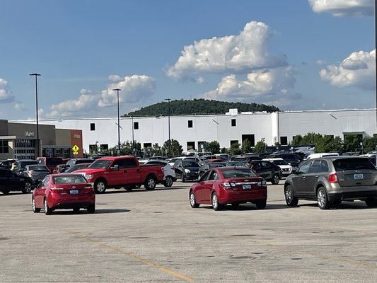 Two huge distribution centers sitting mostly empty and another one being built. Who is making money off of all this?