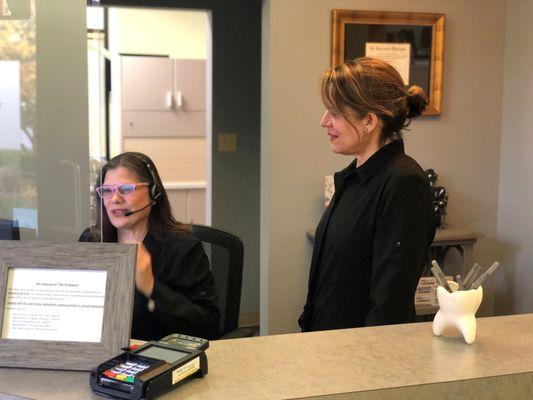 Dr. Goharkhay and Vanessa at the front desk