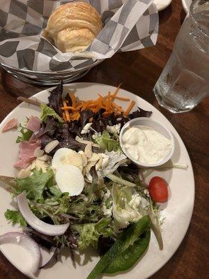 Side salad and croissants