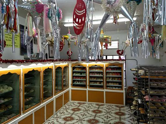 Inside. Piñatas decorate the ceiling