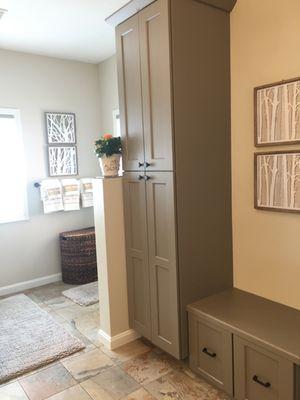 Master Bath After - Removed 2nd vanity and replaced with cabinet storage and seating bench.