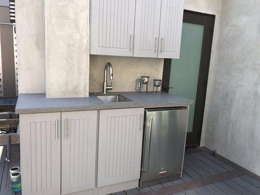 Felipe installed this countertop, cutting around an outdoor chimney