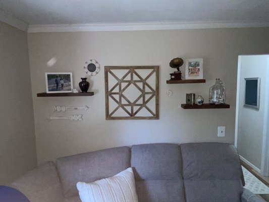 Walls looking bare? Let us help you hang decorations, floating shelves, and photos securely.