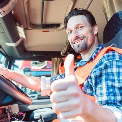 A happy truck driver with the loads