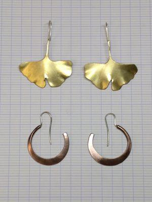 Students work from Beginning Jewelry Fabrication 1. Gingko Leaf earrings made in brass, Hoop earrings in copper