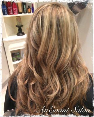 Looks like she was born with golden blonde highlights! Color, cut and styled by Carrie D.