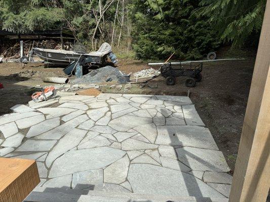 Custom blue pen patio added to backyard