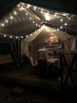 The front porch of our safari tent at night.