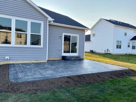 Stamped concrete with steps.