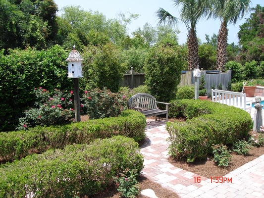 Custom paver walk invites you into the "Secret Garden".