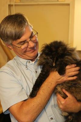 Dr. Thompson and our clinic cat, Gertie!