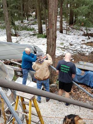 Aaron and our crew tearing down the Car Port at Sierra Trailer Restoration.