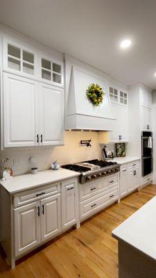 Custom cabinets with custom built hood