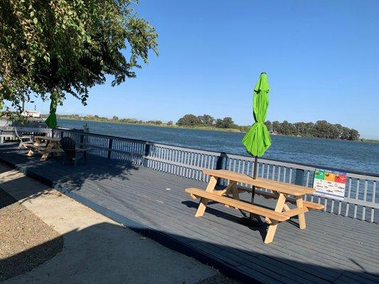 Painted deck new tables and umbrellas