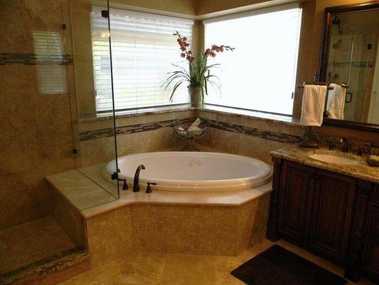 DFW Shower Shop can match your shower wall stone to your bathtub decks & surround, creating you a seamless & flowing bathroom...