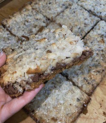 Mama's Yummy Bar
Graham Cracker Crust, Semisweet Chips, Almonds, Coconut Flakes, Topped with a creamy mixture & baked to perfection.