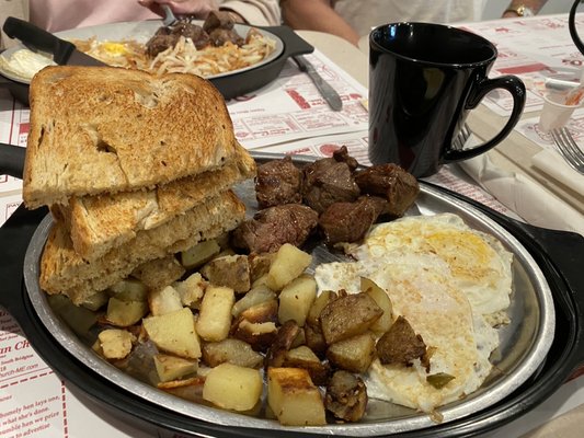 Steak tips + eggs with home fries and rye toast