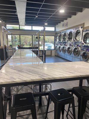 Folding tables at The Laundry Room! Very nice and spacious!