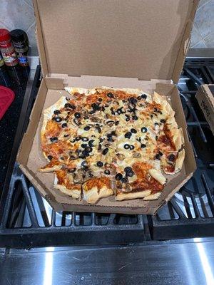 Olives pineapple mushroom pizza, I think?