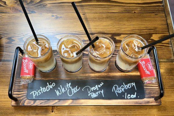 Coffee Flight: Pistachio, White Chocolate, Dragon Berry, and Raspberry Iced