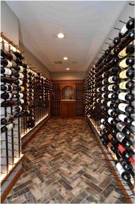 This recently completed contemporary cellar in Charlottesville has traditional design elements. Metal wine racking adds a modern touch.