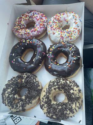 Half Dozen Donuts- Maple Frosted w sprinkles. Chocolate Frosted w sprinkles and strawberry and vanilla