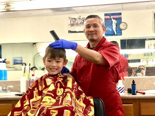 My Grandson Benny and Mr Fong the Barber.