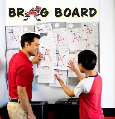 Student's academic achievements are proudly displayed on our learning center's brag board.