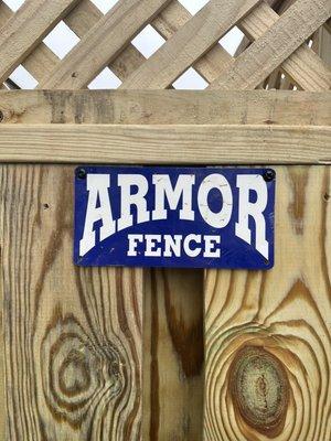 Attach to front of fence