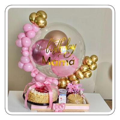 surprise breakfast with a customized bubble balloon and organic balloon decoration.