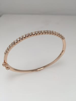 The beautiful rose gold bangle Amin made! Stones are from an heirloom. I am ecstatic with how it turned out!