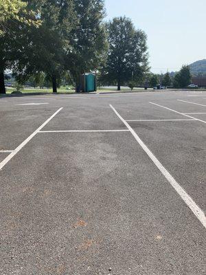 Parking lot...not super accessible for strollers or wheelchairs, FYI. No sidewalk and a semi-steep hill and walk to playground