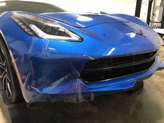 XPEL Ultimate Plus Paint Protection film being installed on this C7 Corvette.