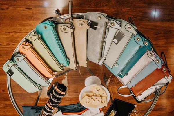 Some of our bestselling wristlets! Comes with a shoulder strap too!