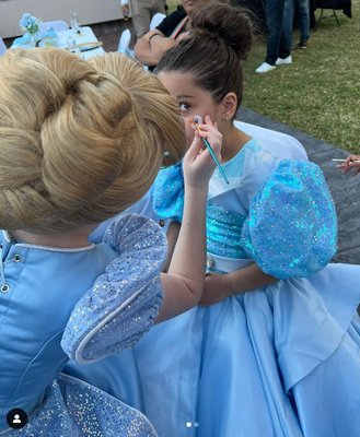 Cinderella Party Character doing Face Paint