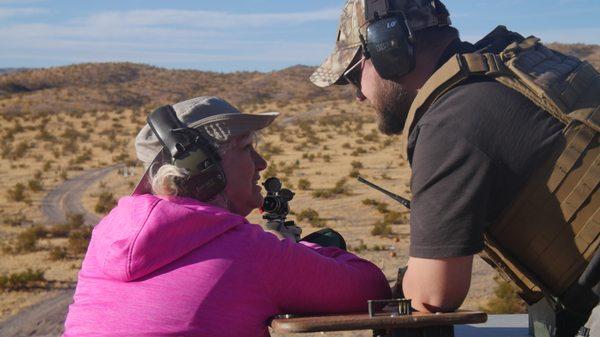 one-on-one instruction with Kal. helping a student shoot a rifle for the fist time, and make hits at 500 yards.