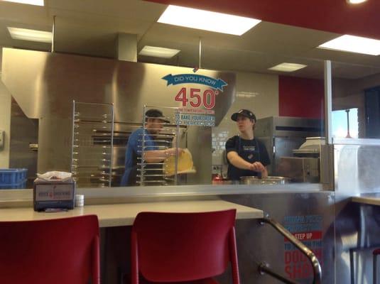 Dominos workers hard at work.