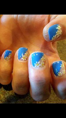 Short acrylics with a fun springtime hand painted design