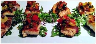 Roasted Halibut with tomato & caper sauce.