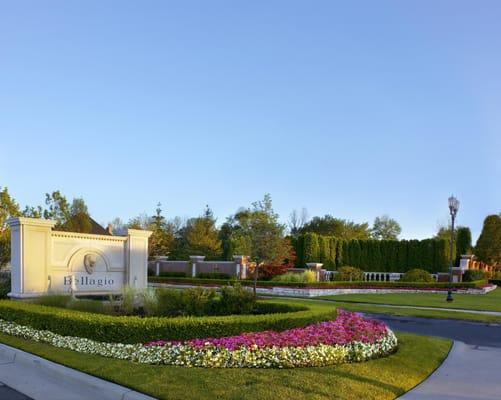 Bellagio Village in Northville, Michigan. Engraved limestone entrance sign with full landscape design