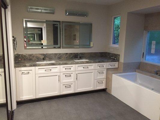 Double sink vanity (Cielo Quartzite Natural Stone).  LED mirriors.